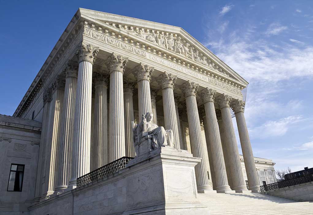 104498510 featured image Supreme Court building with statue and columns.