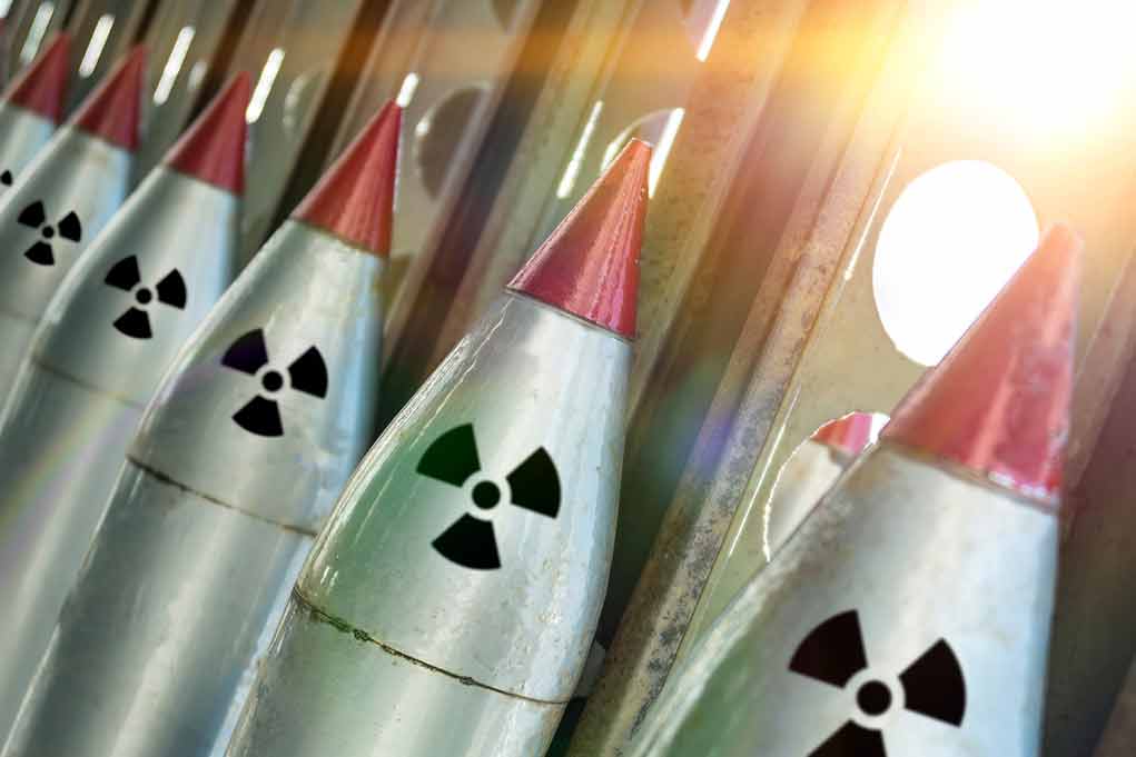 1090003628 featured image Line of nuclear missiles with radiation hazard signs