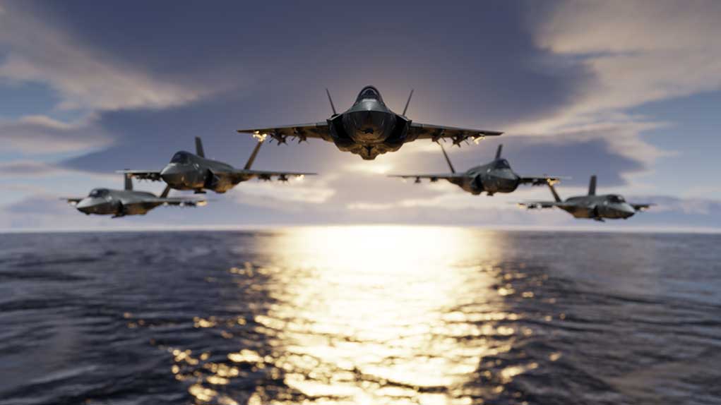 Five fighter jets flying over the ocean