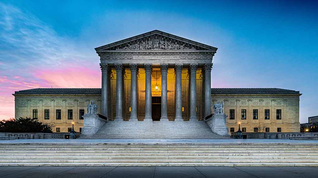 1662354055 featured image Supreme Court building with illuminated pillars and steps