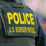 Police US Border Patrol uniform vest closeup