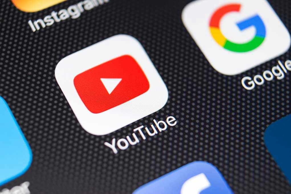 YouTube and Google app icons on a smartphone screen