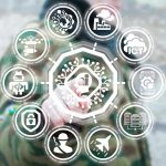 7-Prompt AI Hack Shocks Finance World Person interacting with futuristic holographic interface and icons