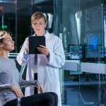 Two Cancer Drugs Show Promise in Reversing Alzheimer’s Woman undergoing brain scan with doctor monitoring results