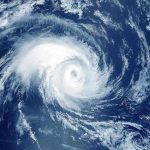 Satellite image of a swirling hurricane over ocean