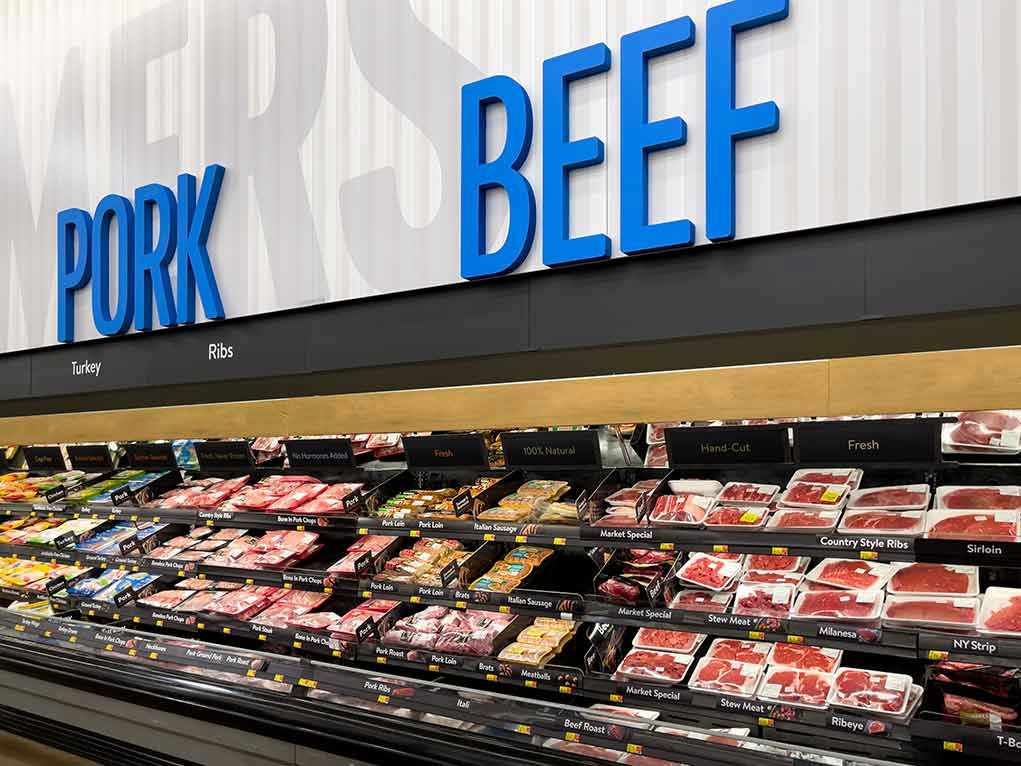 2090853979 Meat section with packaged pork and beef products