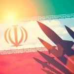 Silhouettes of missiles over Irans flag graphic