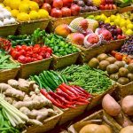 New Study Reveals Shocking Cancer-Fighting Foods A vibrant display of assorted fruits and vegetables in baskets at a market