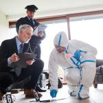 Rogue Student Kills Staff—NO ONE Saw it Coming! Forensic team examining evidence at a crime scene indoors.