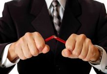 Fetterman’s Filibuster Move Shocks Washington Person breaking red pencil with both hands