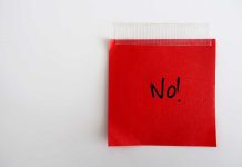 STUNNING Rebuke Rocks Trump Trade Policy A red sticky note with the word 'No!' written in black ink