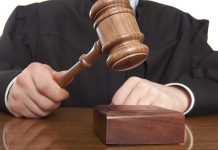 MAX Sentence SHOCKER — Murderous Woman Never WALKS FREE AGAIN A judge holding a gavel above a wooden block