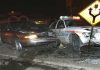 Armed Predator STRIKES Highway Crash Scene A damaged car and a police vehicle involved in a nighttime accident