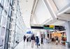 AR-15 Discovery HORRIFIES World’s Busiest Airport Interior of an airport terminal with travelers and signage