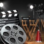 Horror Film Set FATALITY — Veteran Crew ELECTROCUTED Movie set with film reels and clapperboard.