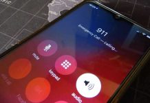 Criminals Target 911 Systems—Americans Die Phone screen showing 911 emergency call in progress.