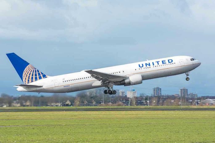 United airplane taking off from a runway.