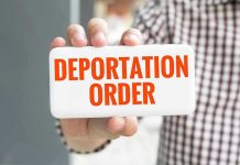ICE Targets New Locations Hand holding sign with Deportation Order text.