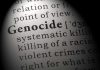 TRUMP WARNING Ignored — Another Massacre Erupts in Nigeria Close-up of the word Genocide in a dictionary with its definition