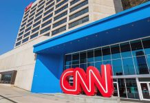 Shocking CNN-Mayor FACEOFF — Viral Political CLASH Exterior view of the CNN headquarters with a large red logo and blue entrance