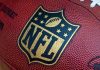 Tensions FLARE Over Super Bowl Performer Pick Close-up of an NFL football with the logo prominently displayed