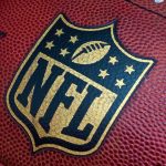 Close-up of an NFL football with the logo prominently displayed