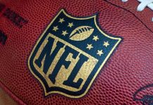 Close-up of an NFL football with the logo prominently displayed