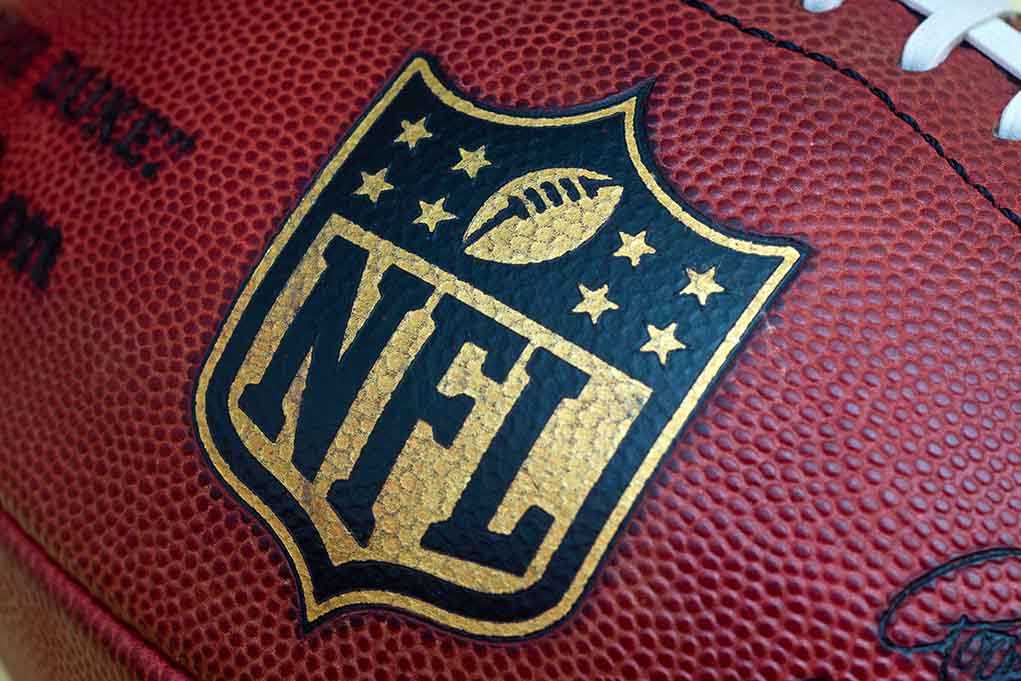 Close-up of an NFL football with the logo prominently displayed