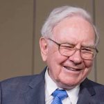 Warren Buffett smiling during a public appearance