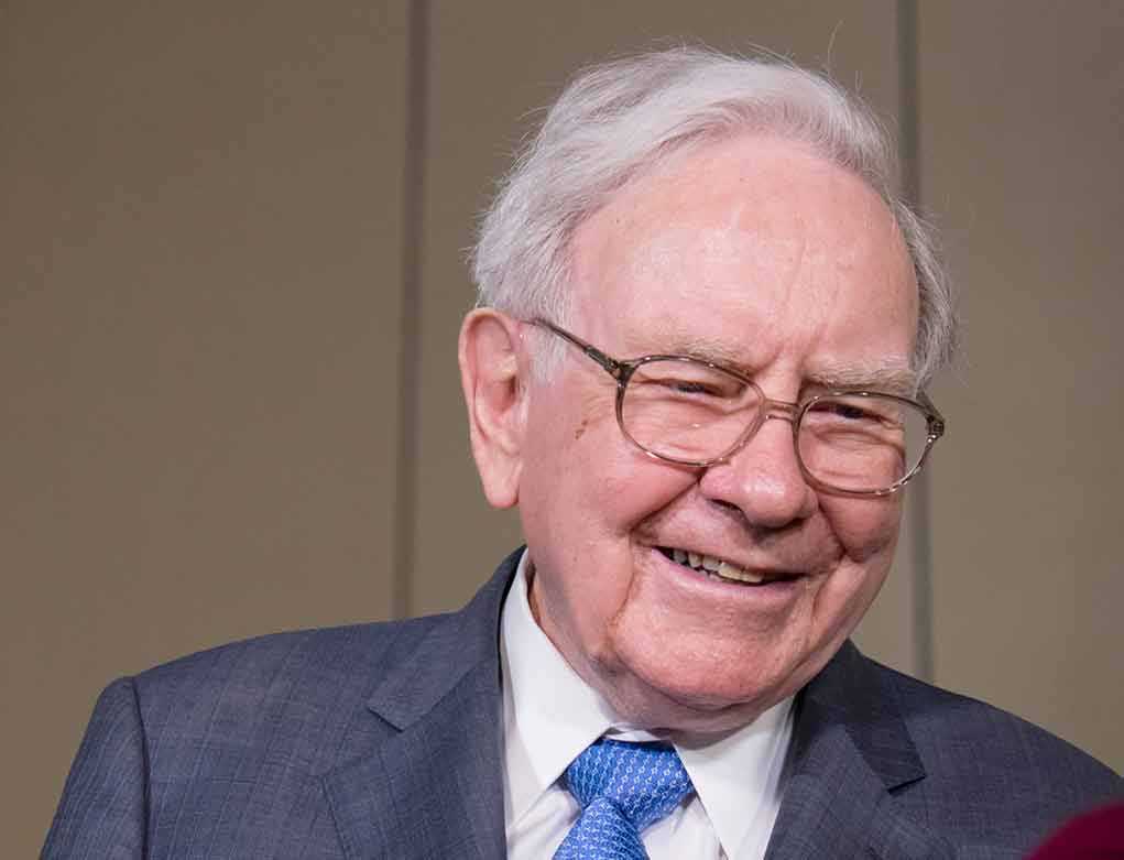 Warren Buffett smiling during a public appearance