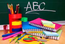 Teacher of the Year CHARGED—Parking Lot Horror Unfolds A collection of colorful school supplies including notebooks, pens, and scissors on a desk