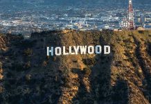 Poltergeist Curse: Chilling Hollywood Mystery Revived The Hollywood sign on a hillside.