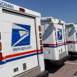 Ignored Warnings Lead to Horrific USPS Fatality Row of USPS mail trucks parked in lot.