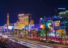 Gunman Escapes! MGM Shooting Sparks Panic Las Vegas Strip at night with bright neon lights.