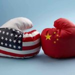 US–China Standoff ERUPTS! USA and China boxing gloves facing each other.
