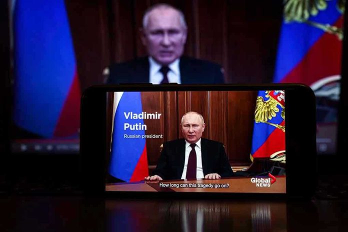 Man speaking on screen with Russian flag background.