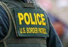 Immigrant Crashes Into ICE Vehicle Police U.S. Border Patrol uniform close-up.
