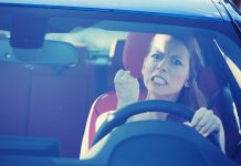 Amherst Skits SPARK OUTRAGE — Parents Furious! Angry woman gripping the steering wheel in a car