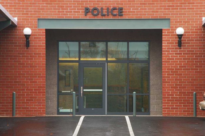 shutterstock_40297654.jpg Entrance of a modern police station with brick facade