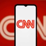 CNN Interview With Biden Supporter Backfires CNN logo on a phone screen.