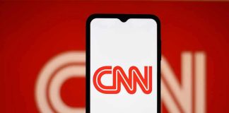 CNN logo on a phone screen.
