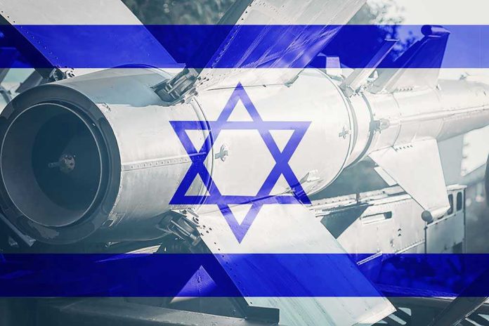 673097776 Missile with Israel flag overlay.