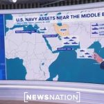 US carrier strike group arrives as Trump weighs military