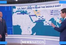 US carrier strike group arrives as Trump weighs military