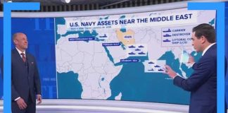 US carrier strike group arrives as Trump weighs military