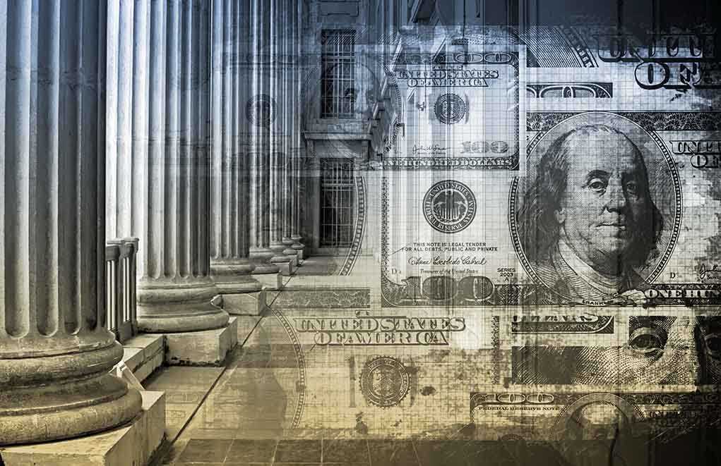 Architectural columns with a background of U.S. currency