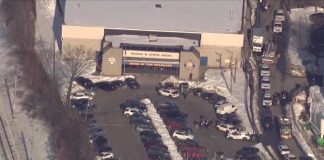 Woman says her father opened fire in hockey rink, 'has