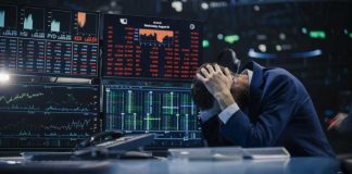 Trillion-Dollar Fantasy Meets Cold Math Trader stressed out by multiple declining stock charts.