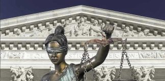 Supreme Court’s Ruling – A HUGE Implications! Lady Justice statue in front of courthouse.
