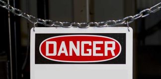 From Viral Meme to Real Danger: Truth Behind “Alaska Man Monday” A warning sign displaying the word DANGER in bold red letters